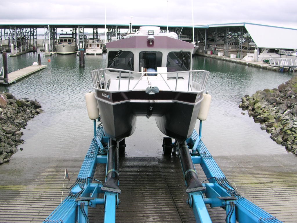 Workboat on haulout ramp at marina